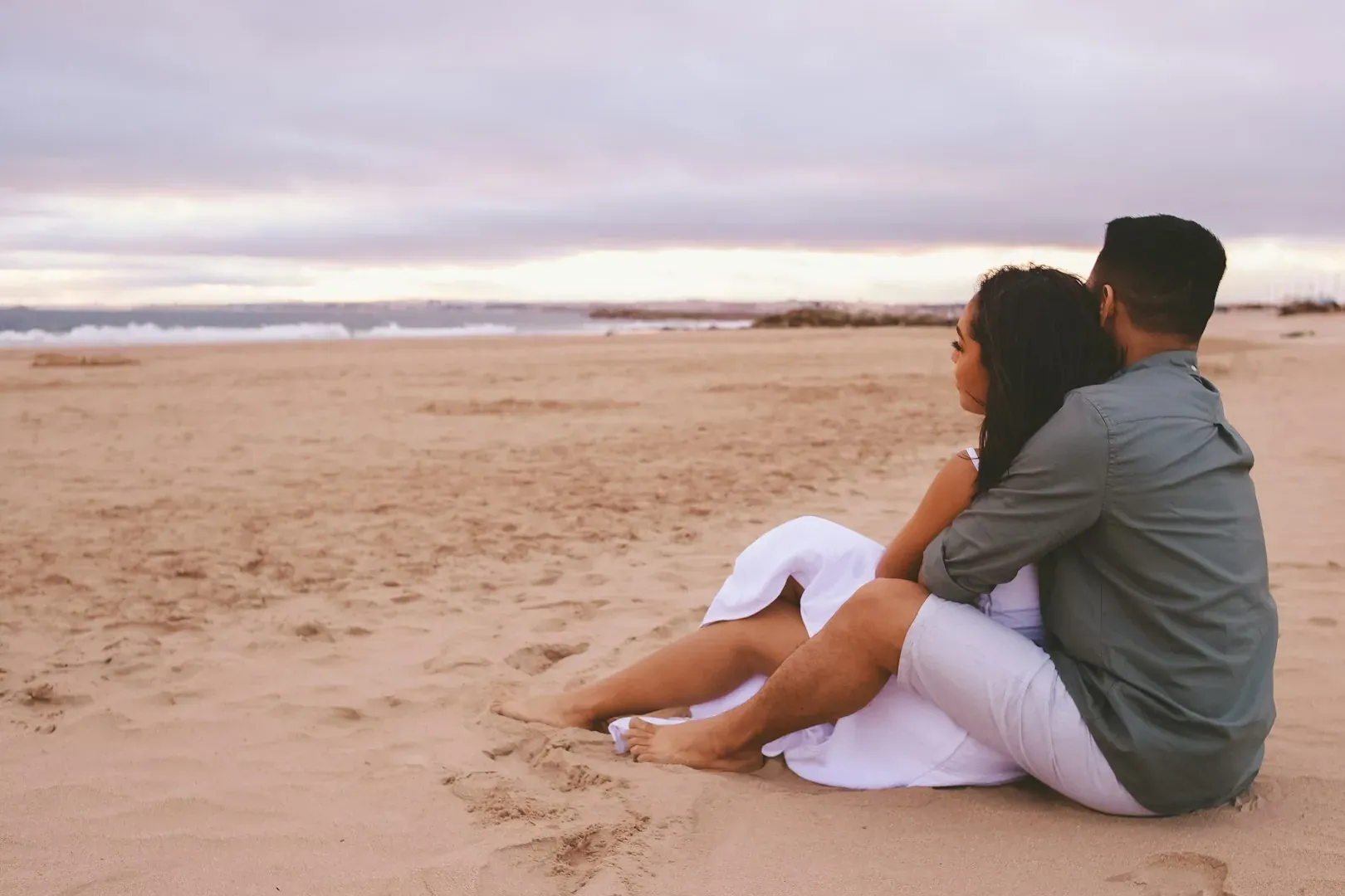 A couple on the beach in Costa da Caparica, Margem Sul